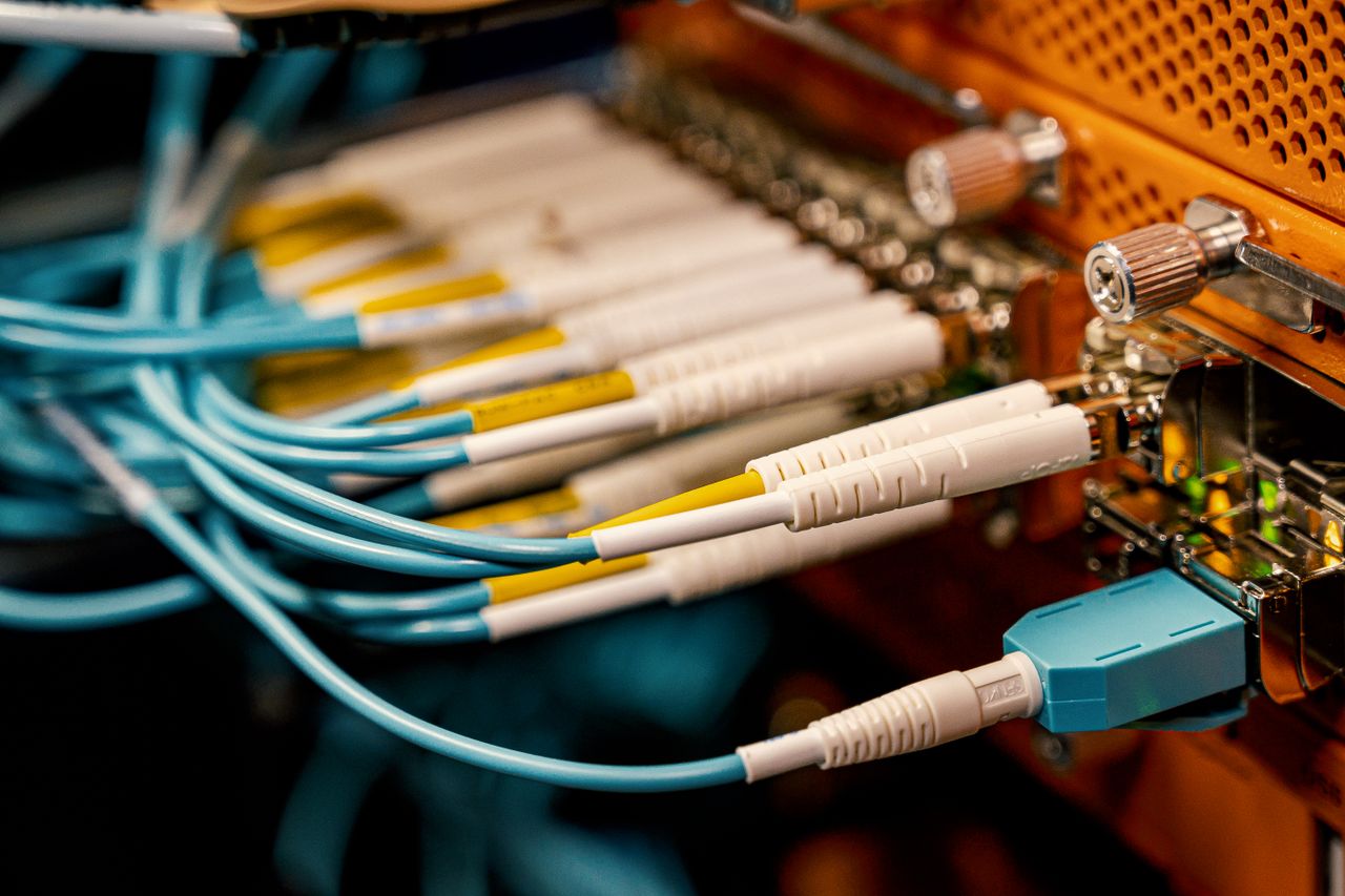 The Art of Drawing Readers In: Your attractive post title goes here From above of optical switch equipment with many similar connectors with rubber cables and metal parts